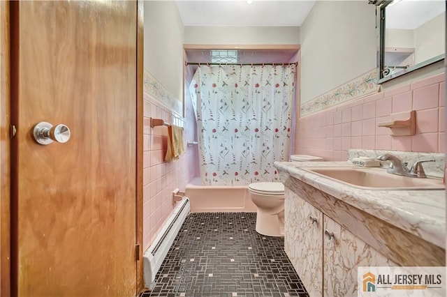 20 Kennedy St, Iselin, NJ 08830 - full bath featuring baseboard heating, tile walls, vanity, wainscoting, and shower / bath combination with curtain