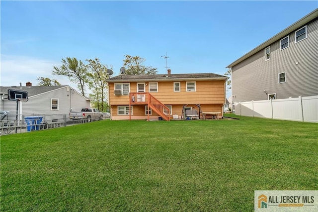 20 Kennedy St, Iselin, NJ 08830 - rear view of property with a fenced backyard and stairs