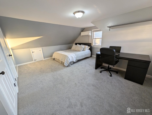 carpeted bedroom with vaulted ceiling, a wall mounted AC, and baseboards