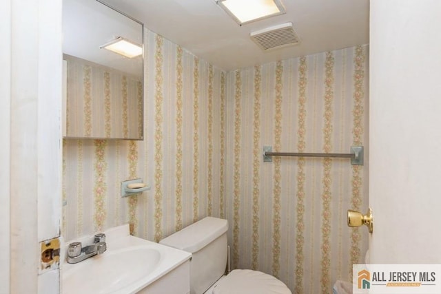 5 Berkley Blvd, Iselin, NJ 08830 - half bathroom featuring toilet and vanity