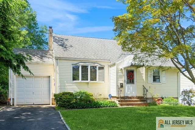 5 Berkley Blvd, Iselin, NJ 08830 - view of front of home with a garage, a front yard, driveway, a chimney, and entry steps