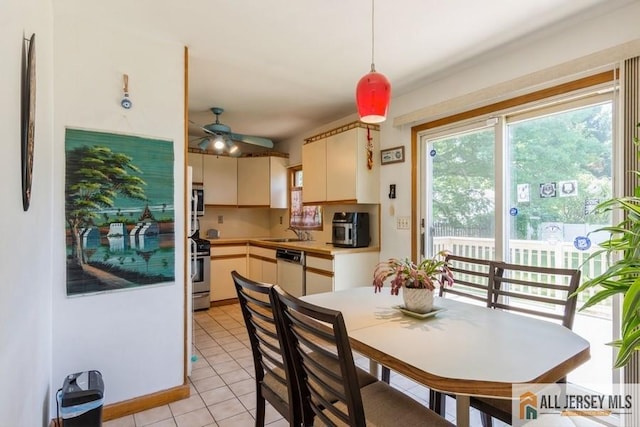 5 Berkley Blvd, Iselin, NJ 08830 - dining room featuring light tile patterned floors and ceiling fan