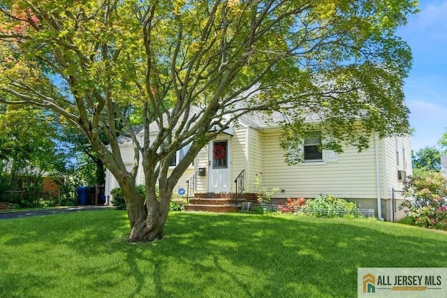 5 Berkley Blvd, Iselin, NJ 08830 - view of property hidden behind natural elements with a front lawn and entry steps