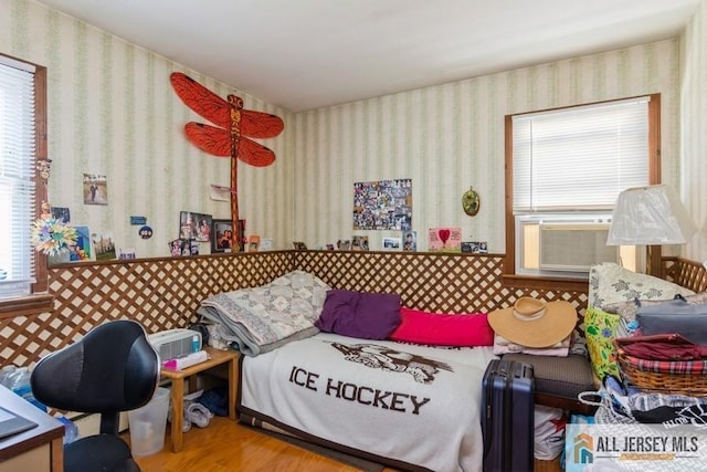 5 Berkley Blvd, Iselin, NJ 08830 - bedroom featuring wood finished floors, wallpapered walls, and cooling unit