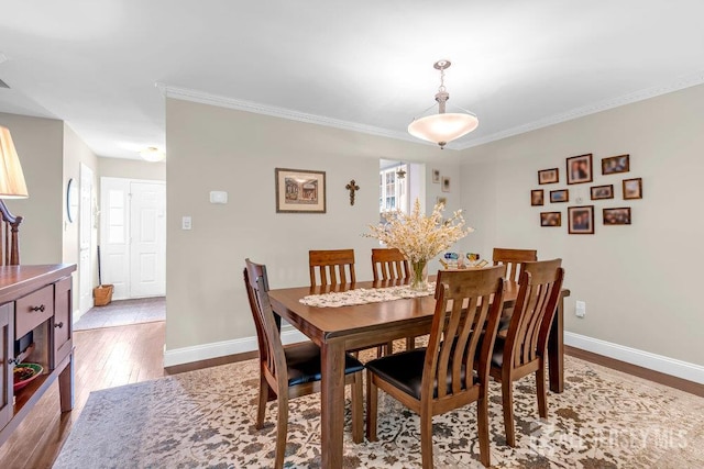 223 Perth Hill Ct, Matawan, NJ 07747 - dining room featuring wood finished floors, crown molding, and baseboards