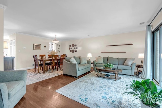 223 Perth Hill Ct, Matawan, NJ 07747 - living room with dark wood finished floors, ornamental molding, and baseboards