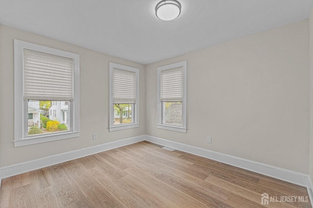307 Wayne St, Highland Park, NJ 08904 - empty room featuring light wood-type flooring and baseboards