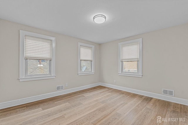 307 Wayne St, Highland Park, NJ 08904 - unfurnished room featuring light wood-style flooring and baseboards