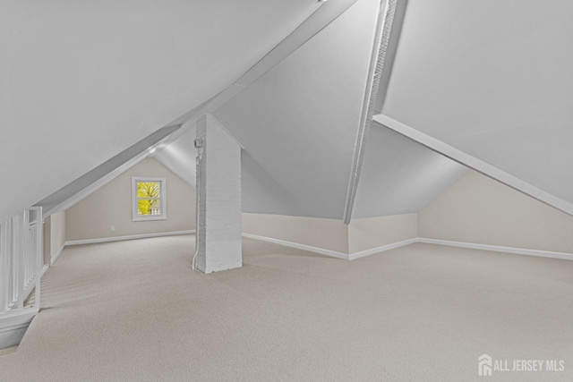 307 Wayne St, Highland Park, NJ 08904 - additional living space featuring vaulted ceiling and carpet floors