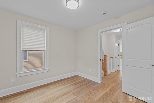 307 Wayne St, Highland Park, NJ 08904 - unfurnished room with light wood-style flooring and a smoke detector