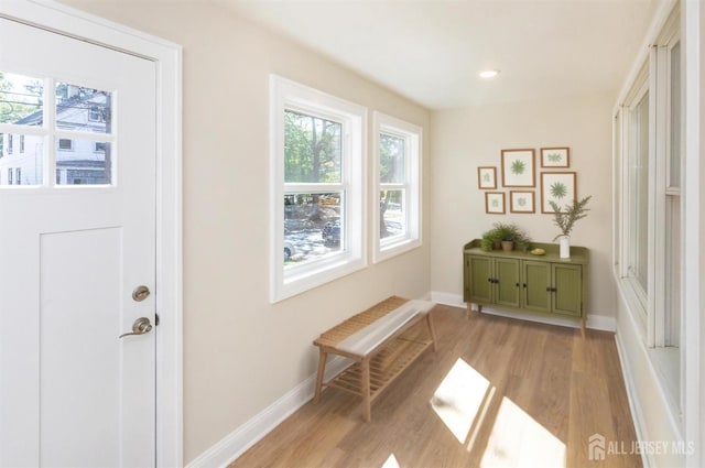 307 Wayne St, Highland Park, NJ 08904 - entryway with healthy amount of natural light, light wood-style flooring, and recessed lighting