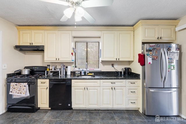 kitchen featuring a sink, ceiling fan, under cabinet range hood, cream cabinetry, and black appliances