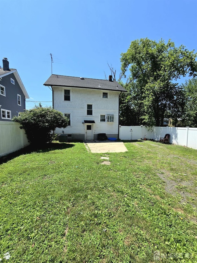 237 Prospect Ave, Dunellen, NJ 08812 - back of house with a fenced backyard and a patio