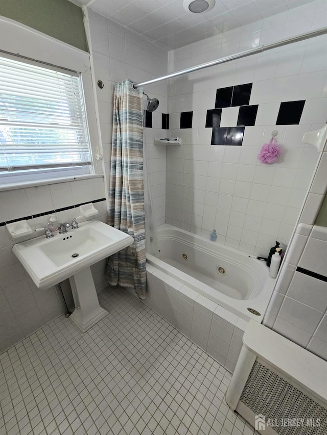 237 Prospect Ave, Dunellen, NJ 08812 - full bathroom featuring a combined bath / shower with jetted tub, tile walls, and tile patterned flooring