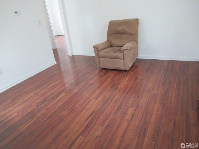 68 Macarthur Ave, Sayreville, NJ 08872 - sitting room with dark wood-style flooring and baseboards