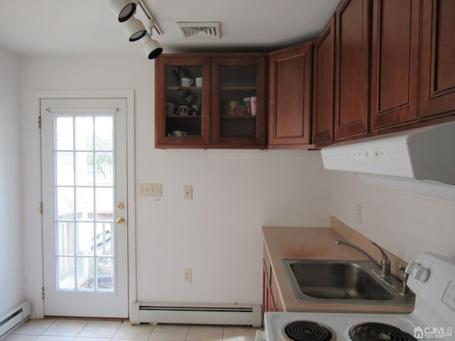 68 Macarthur Ave, Sayreville, NJ 08872 - kitchen featuring a baseboard radiator, baseboard heating, range, glass insert cabinets, and light tile patterned flooring
