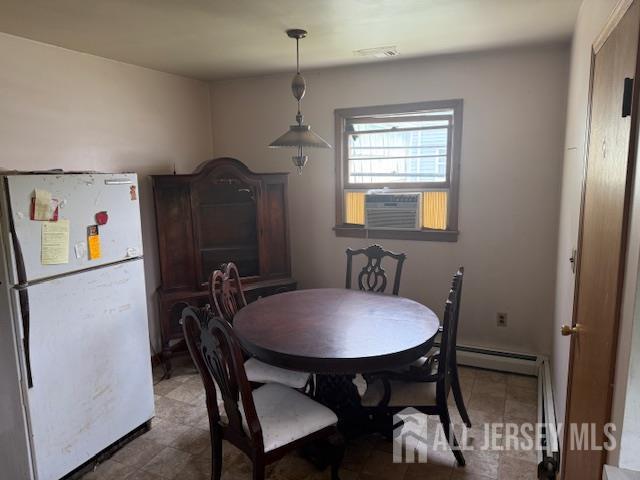 397 Lake Ave, Colonia, NJ 07067 - dining space with a baseboard heating unit and cooling unit
