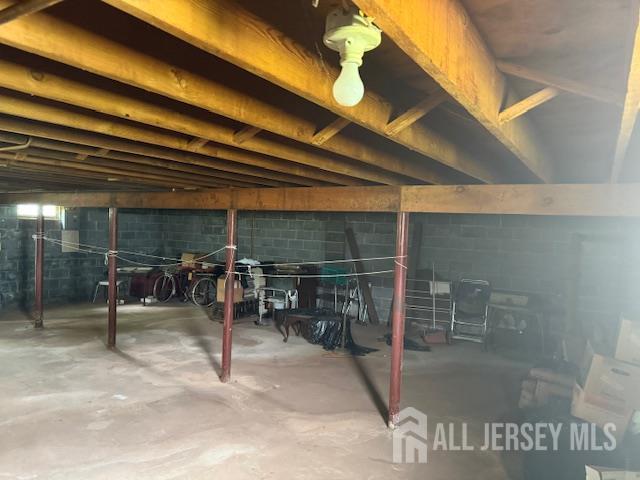 397 Lake Ave, Colonia, NJ 07067 - unfinished below grade area featuring concrete block wall