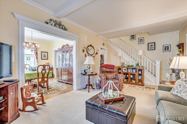 carpeted living room featuring stairs, an inviting chandelier, crown molding, and baseboards