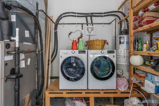 324 Greene Ave, Middlesex, NJ 08846 - laundry area featuring water heater, heating unit, and washer and dryer
