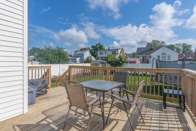 324 Greene Ave, Middlesex, NJ 08846 - deck featuring outdoor dining space, a residential view, a fenced backyard, and a shed
