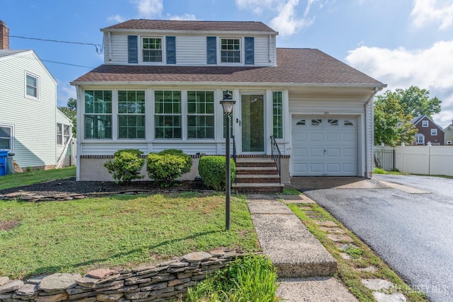 324 Greene Ave, Middlesex, NJ 08846 - traditional-style home featuring a garage, asphalt driveway, and a shingled roof