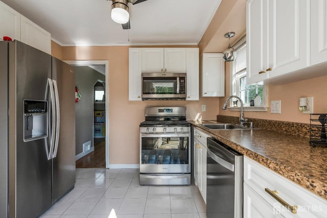324 Greene Ave, Middlesex, NJ 08846 - kitchen with stainless steel appliances, white cabinets, dark countertops, ceiling fan, and light tile patterned floors