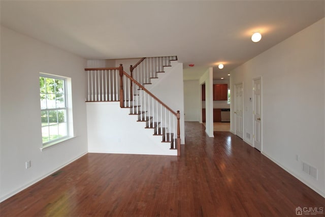 interior space featuring dark wood-type flooring