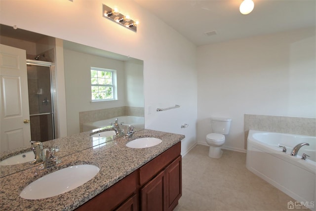 full bathroom with tile patterned flooring, vanity, toilet, and independent shower and bath