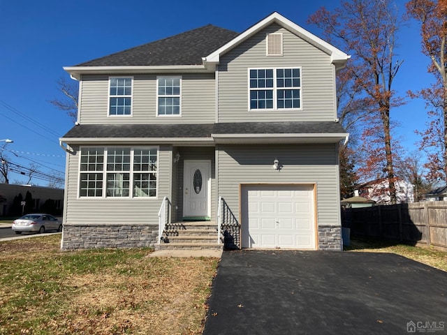 view of front property with a garage