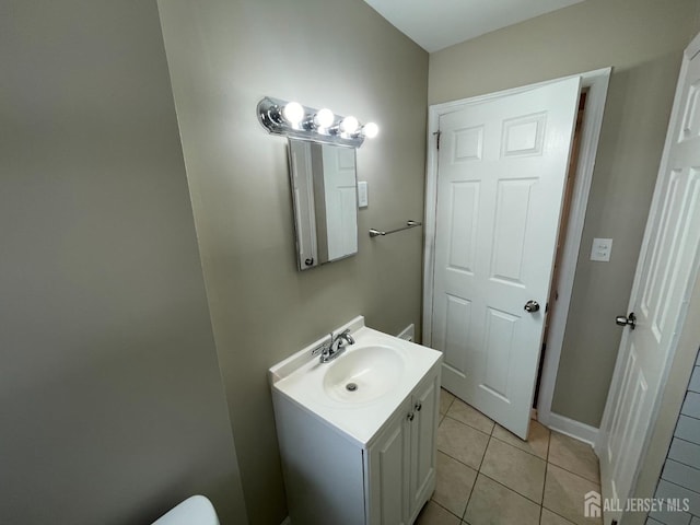 520 Hayward St, Bound Brook, NJ 08805 - half bath featuring tile patterned flooring and vanity