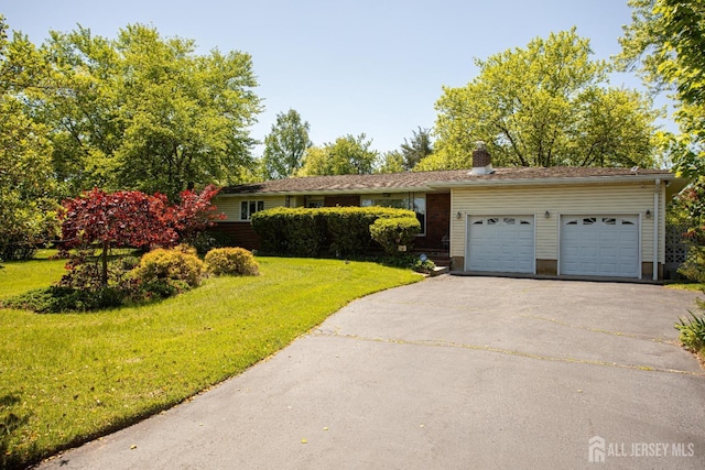 282 Bridgepoint Rd, Montgomery, NJ 08502 - ranch-style house with asphalt driveway, a front yard, a garage, and a chimney
