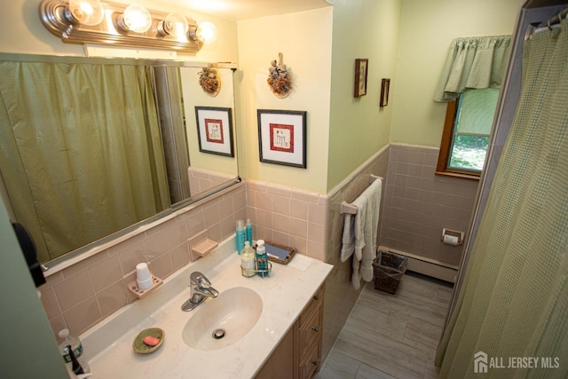 282 Bridgepoint Rd, Montgomery, NJ 08502 - full bath with baseboard heating, vanity, tile walls, wainscoting, and curtained shower