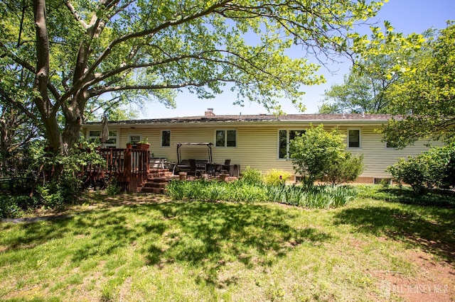 282 Bridgepoint Rd, Montgomery, NJ 08502 - back of property with a yard and a wooden deck