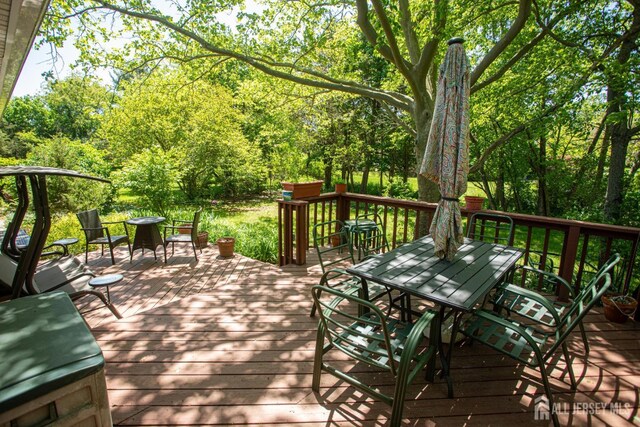 282 Bridgepoint Rd, Montgomery, NJ 08502 - wooden deck featuring outdoor dining space