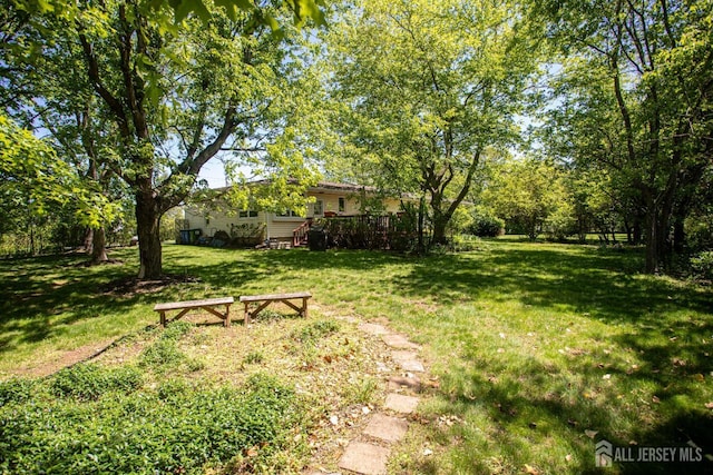 282 Bridgepoint Rd, Montgomery, NJ 08502 - view of green lawn featuring a deck