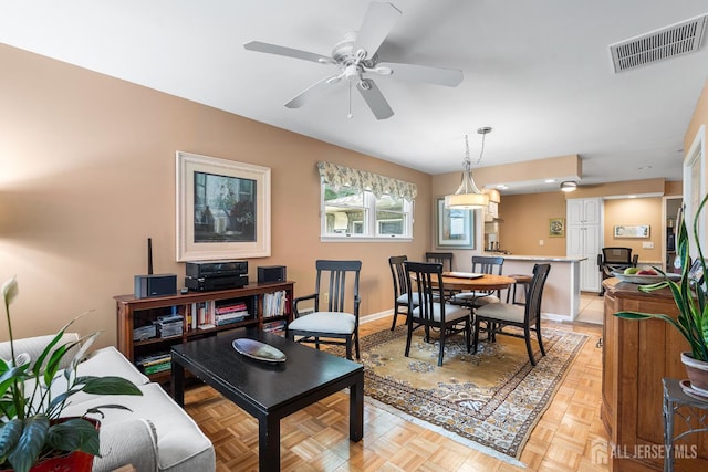 13 Quincy Rd, East Brunswick, NJ 08816 - dining area with a ceiling fan and baseboards