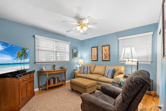 13 Quincy Rd, East Brunswick, NJ 08816 - living room with ceiling fan and light wood finished floors