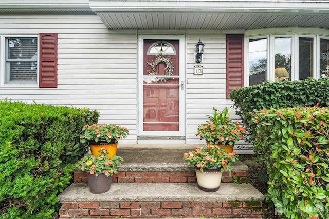 13 Quincy Rd, East Brunswick, NJ 08816 - doorway to property featuring a porch