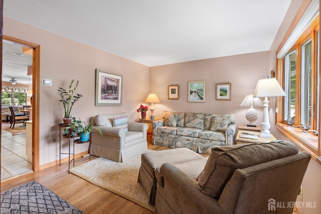 13 Quincy Rd, East Brunswick, NJ 08816 - living area with light wood-type flooring and baseboards