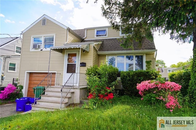 5 Gardner Pl, Sayreville, NJ 08859 - view of front of house with an attached garage and a shingled roof