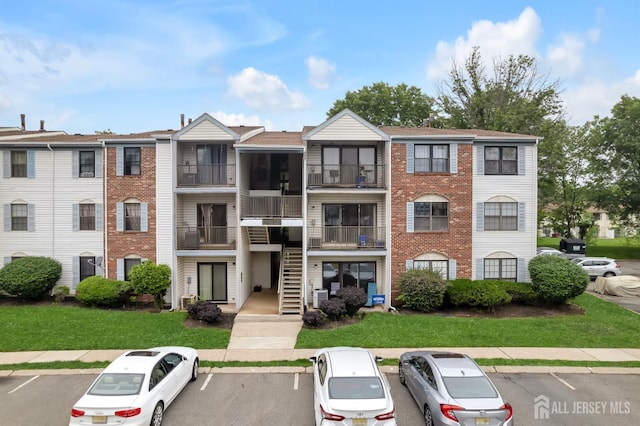 352 Lancaster Ct, Piscataway, NJ 08854 - view of building exterior with uncovered parking