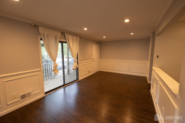 4319 Birchwood Ct, North Brunswick, NJ 08902 - spare room with a decorative wall, crown molding, recessed lighting, and dark wood-style flooring