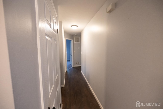 4319 Birchwood Ct, North Brunswick, NJ 08902 - hall featuring dark wood-style floors and baseboards