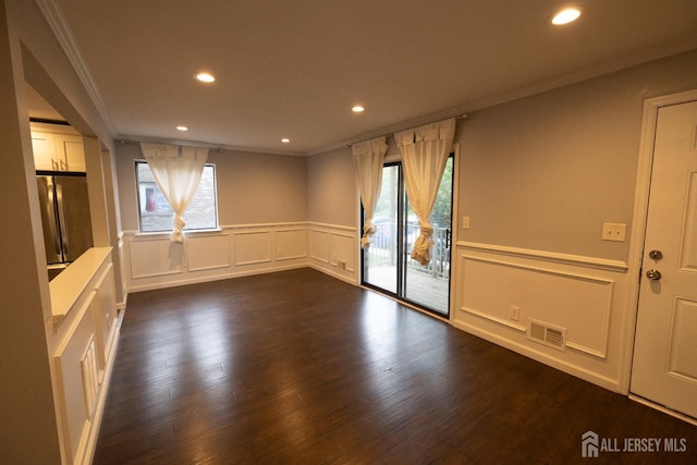 4319 Birchwood Ct, North Brunswick, NJ 08902 - empty room featuring ornamental molding, a decorative wall, recessed lighting, a wainscoted wall, and dark wood finished floors