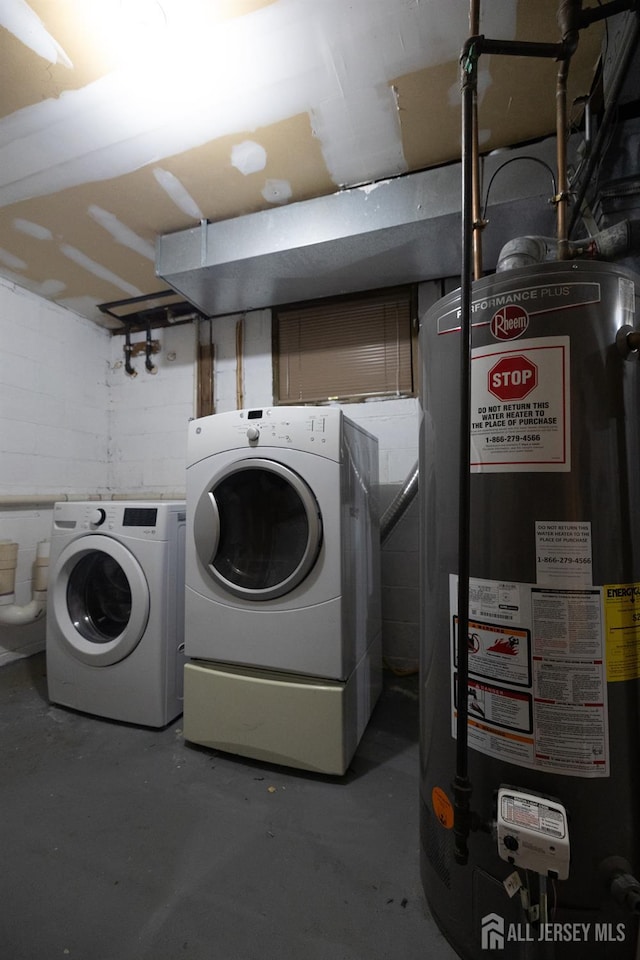 4319 Birchwood Ct, North Brunswick, NJ 08902 - laundry area with water heater and separate washer and dryer