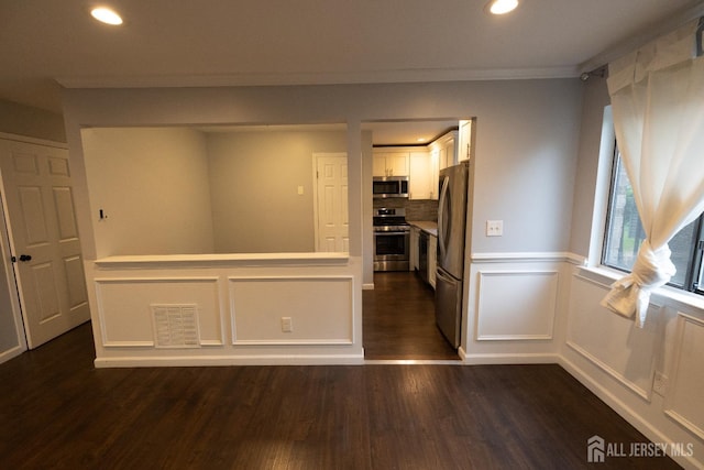 4319 Birchwood Ct, North Brunswick, NJ 08902 - unfurnished room featuring dark wood finished floors, a decorative wall, ornamental molding, and recessed lighting