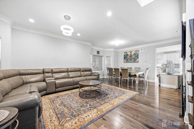 767 Coolidge Ave, Woodbridge Proper, NJ 07095 - living area with crown molding, wood-type flooring, baseboards, and recessed lighting