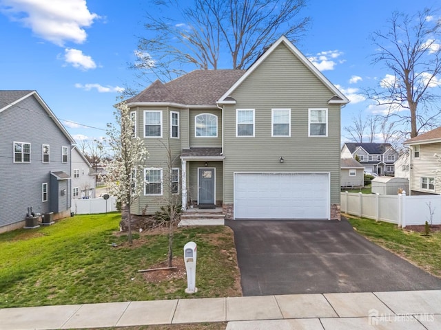 767 Coolidge Ave, Woodbridge Proper, NJ 07095 - traditional-style home with an attached garage and driveway
