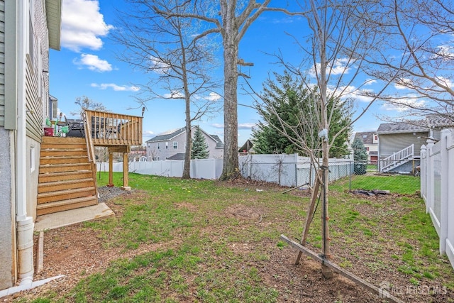767 Coolidge Ave, Woodbridge Proper, NJ 07095 - view of yard featuring stairway, a deck, and a residential view